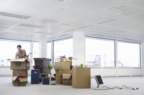 Moving team arranging boxes during Camden relocation