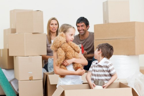 Packing boxes and furniture into a moving truck in Camden
